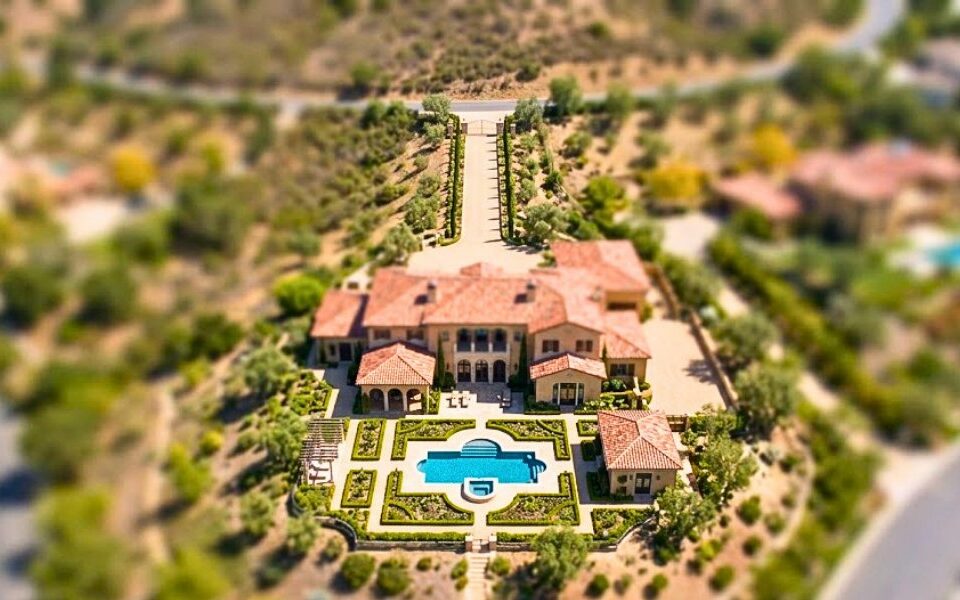 Rancho Santa Fe estate with aerial property images showing year over year changes.